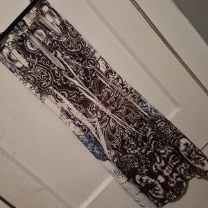 Small Strapless Dress With Pretty Sparkly Design On Front Curve Fitting